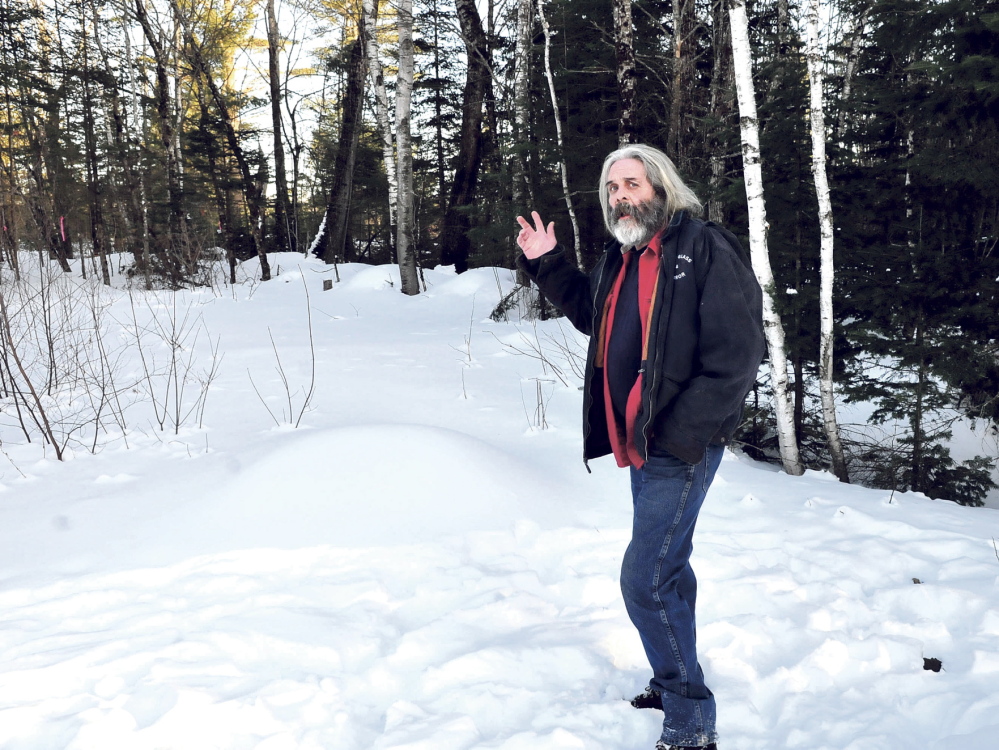 TOO CLOSE: Athens homeowner Fred Tape talks on Wednesday about the logging operation that is happening right up to his boundary line. Tape said he has asked the wood cutters to leave a buffer zone near the property line ,but without success.