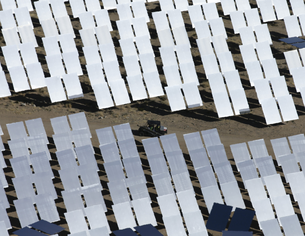 Some of the computer-controlled mirrors, each about 7 feet high and 10 feet wide, reflect sunlight to boilers. The sun is used to heat water in the boilers’ tubes to make steam, which in turn drives turbines to create electricity.