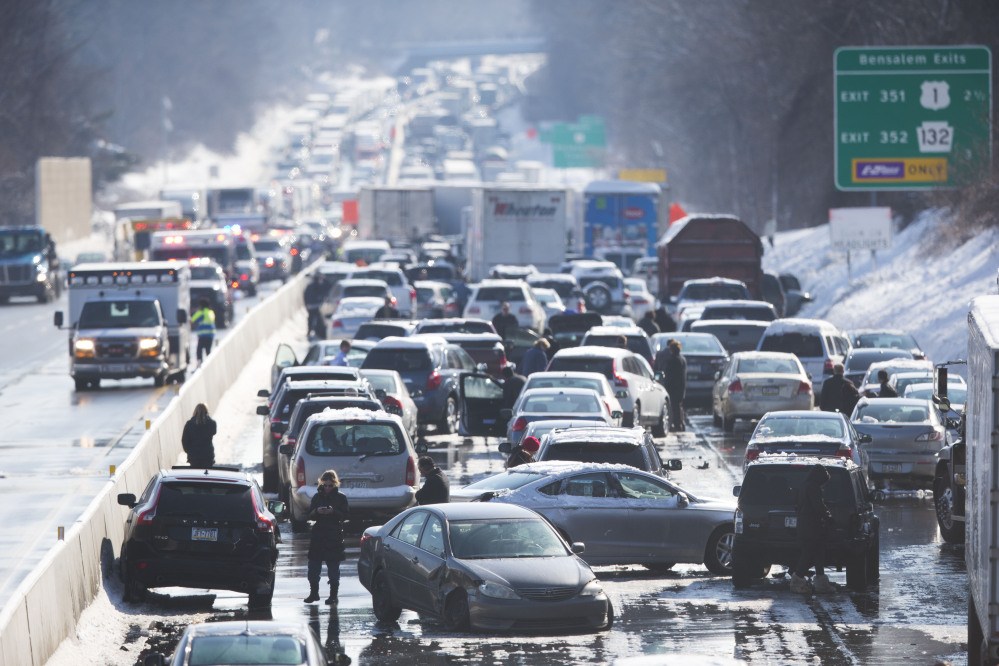 Vehicles are piled up in an accident Friday in Bensalem, Pa. The accident outside Philadelphia and caused some injuries.