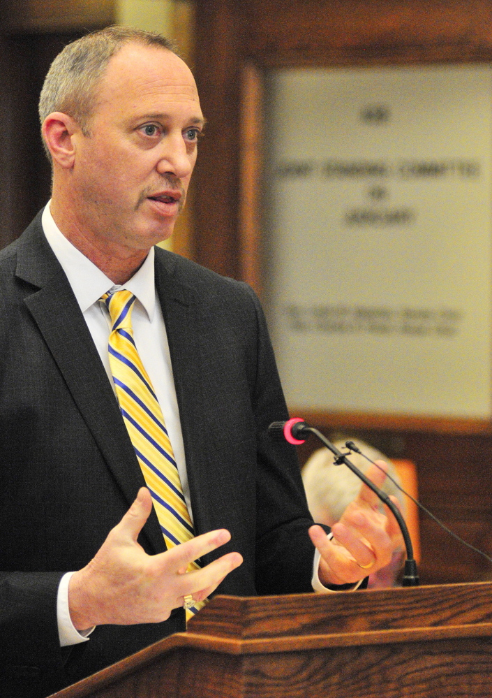 Top: South Portland Police Detective Sgt. Steve Webster testifies Thursday at the State House in Augusta. Above: Rep. Amy Volk, R-Scarborough, introduces the bill, LD 1730.