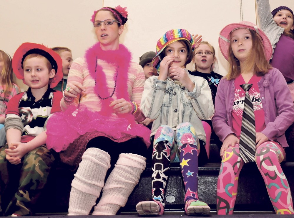 INTERACTIVE: Students and teachers got dressed up for a presentation on Thursday by Skowhegan native and author Lynn Plourde at Madison Elementary School. Plourde read from her new book, titled “You’re Wearing THAT To School?” From left are Nick Krajewski, teacher Katie Flannery, Laura Holden and Gabby Sawyer.
