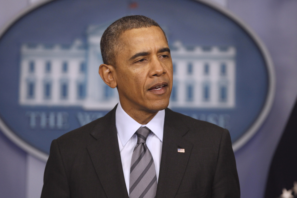 President Barack Obama talks about the situation in Ukraine on Thursday in the briefing room of the White House in Washington.