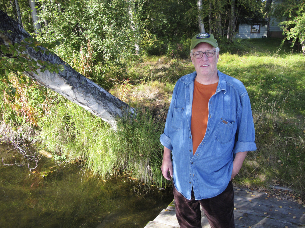 Joe McGinniss was working on a book on former Alaska Gov. Sarah Palin, at the time of this 2010 photo. He is posing at the home he was renting next to Palin’s home in Wasilla, Alaska..