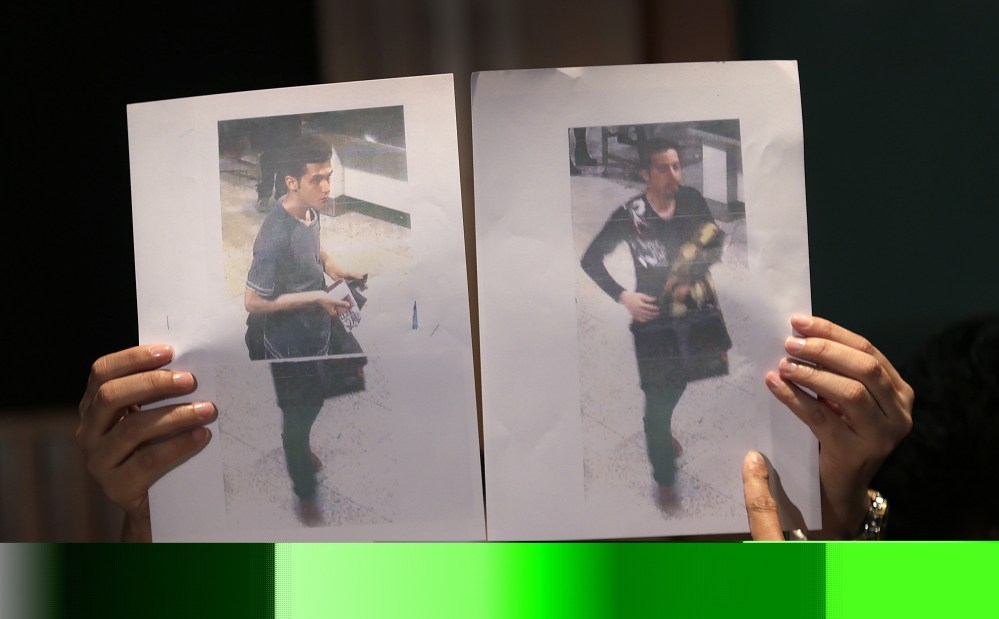 Pictures of the two men, a 19-year old Iranian, identified by Malaysian police as Pouria Nour Mohammad Mehrdad, left, and Delavar Seyedmohammaderza, 29, who boarded the now missing Malaysia Airlines jet MH370 with stolen passports.