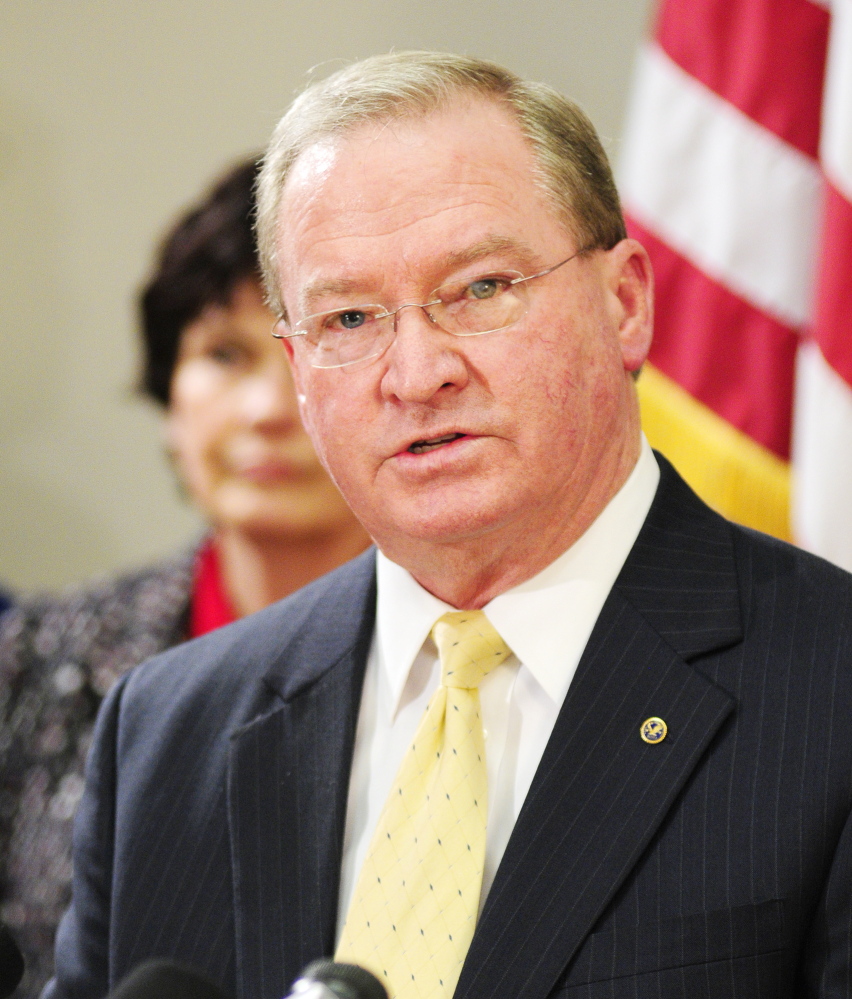 Roy McKinney, director of the Maine Drug Enforcement Agency, speaks during Tuesday's news conference.