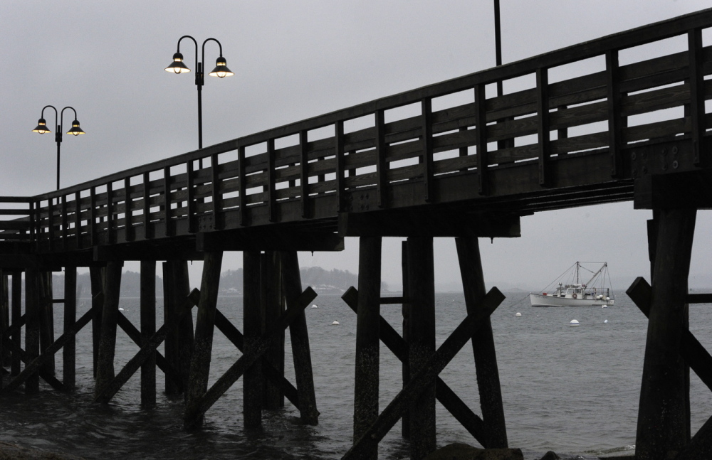 A single lobster boat is moored off Falmouth’s Town Landing during Wednesday’s increasingly rough weather. Thursday’s forecast calls for northwest winds of 20 to 25 mph gusting to 35 mph and wind chills as low as 3 below zero along the southern Maine coast.