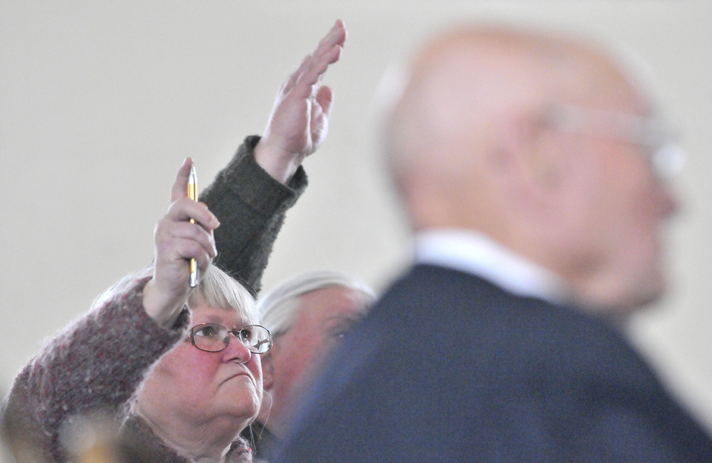 Taking part: Patricia Lanning votes during the Benton Town Meeting at the Benton Grange on Saturday.