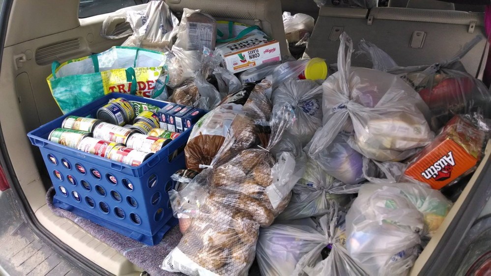 FEEDING THE HUNGRY: Augusta resident Sherry Truppa and her daughter Katie went to Walmart Friday to get food to donate to the East Winthrop Baptist Church’s Food Ministry after the Kennebec Journal reported that the pantry may be forced to close.