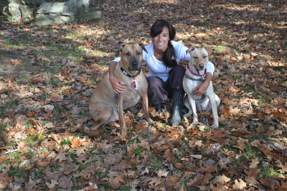 IN HER HONOR: Amy Buxton, who died last year at age 26, loved her dogs Melina and Ollie and would have wanted to volunteer at the pet food pantry that will open in her memory.
