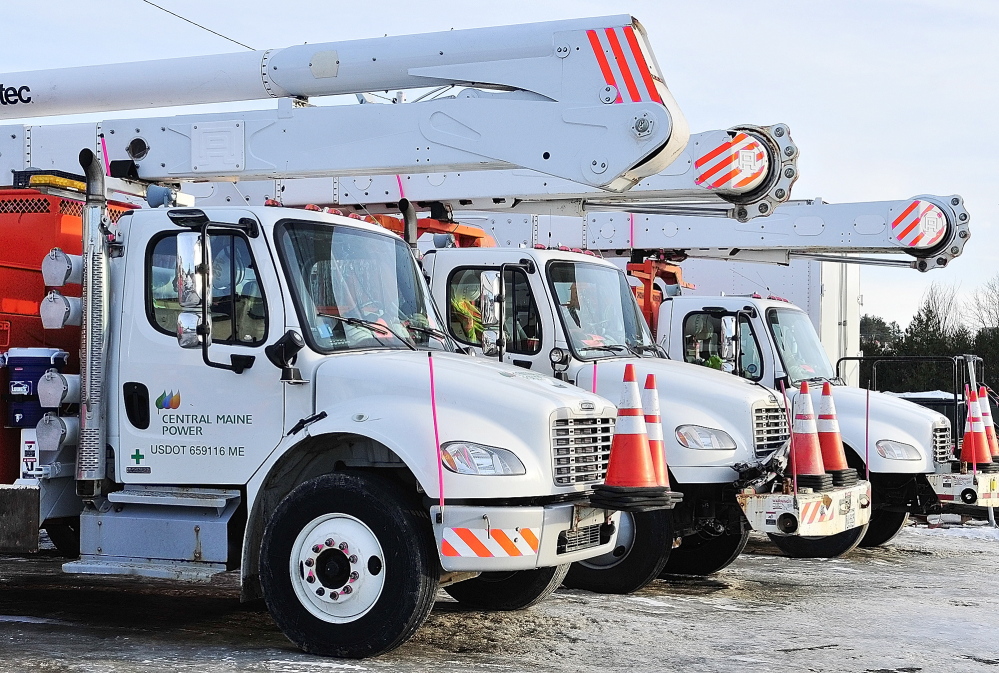 Staff file photo by Joe Phelan TAX TIFF: Rows of vehicles are parked on Friday March 7, 2014 at Central Maine Power’s Augusta Service Building on Old Winthrop Road. A bill that would have seen CMP pay excise taxes in communities other than Augusta was voted down in the Senate Thursday.