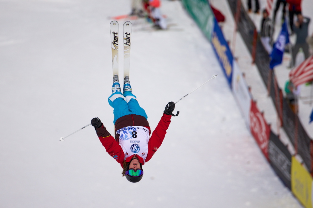 FLYING HIGH: Alex Jenson, 19, of Waterville competes in the Moguls competition at the 2014 US Freestyle National Championships.