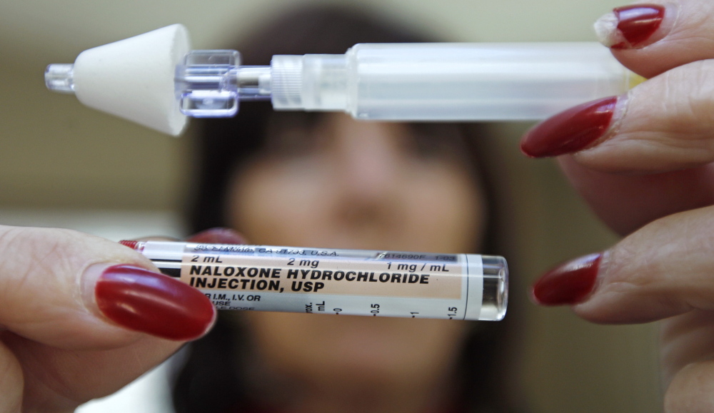 Kathy Deady displays a tube of naloxone, also known by its brand name Narcan, at her home in Quincy, Mass. Naloxone is a nasal spray used as an antidote for opiate drug overdoses. Deady had to use naloxone twice on her son, who had overdosed on heroin. Maine Gov. Paul LePage now says he is willing to allow some family members of opiate addicts to have access to the drug, but not police or EMTs.