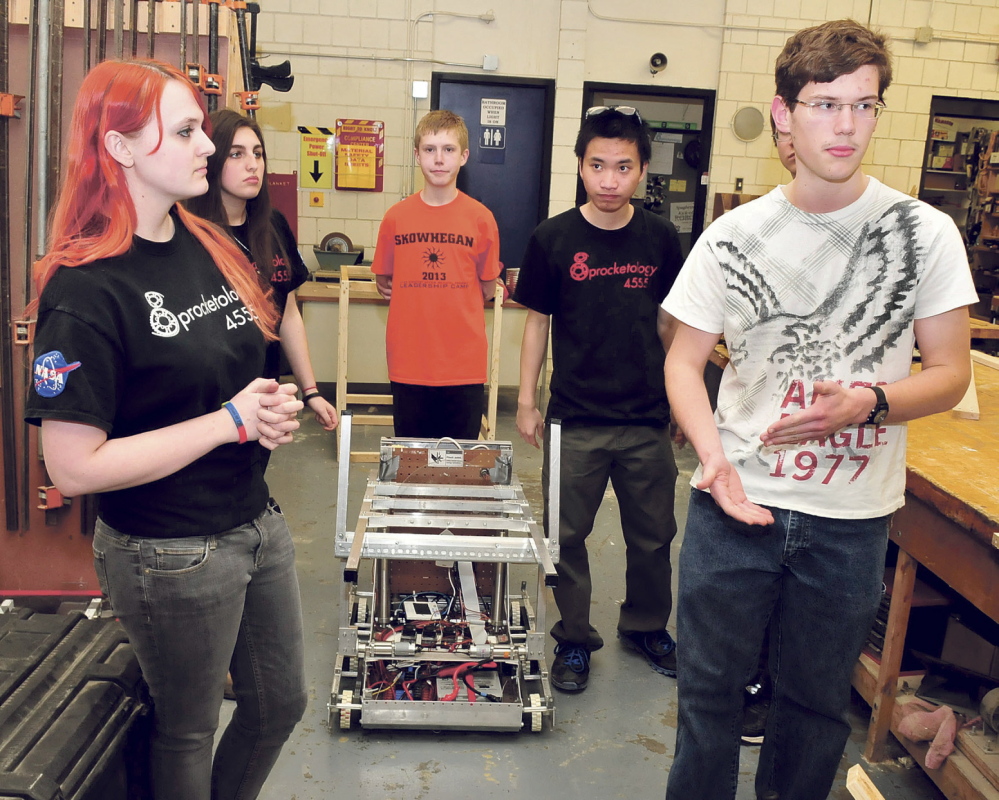 SILENT PARTNER: Members of the Skowhegan Area High School Sprocketology team including Samantha Wilkins, left, and Eben Lenfest.