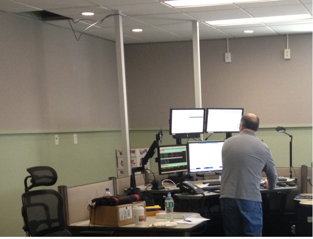 Up and running: Dispatcher Tom Marble tests the computer system Friday at the new Franklin County Communications Center.