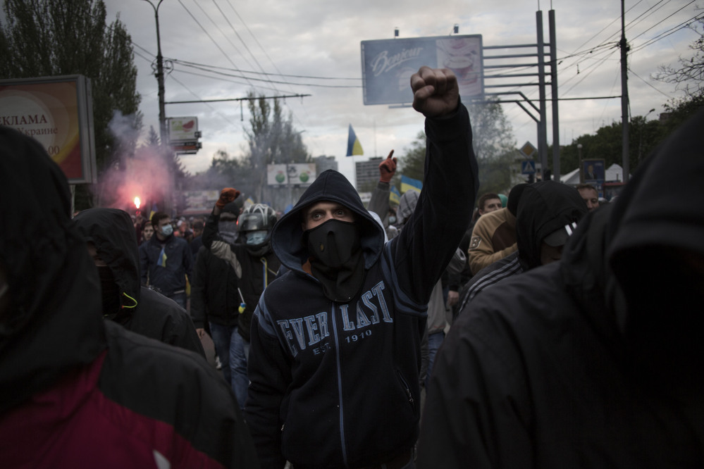 A pro-Ukrainian man chants slogans against Russian president Vladimir Putin during a rally in Donetsk on Monday.