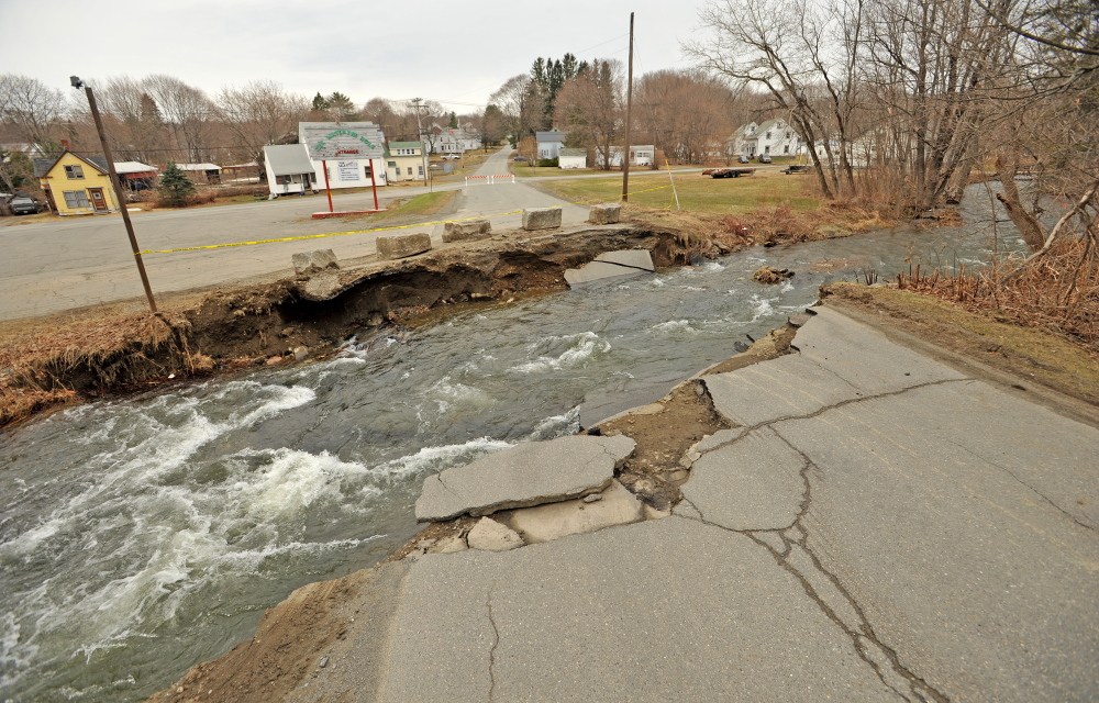 DEXTER FLOODING: A week after the east branch of the Sebasticook River flooded, Lincoln Street in Dexter remained impassible.