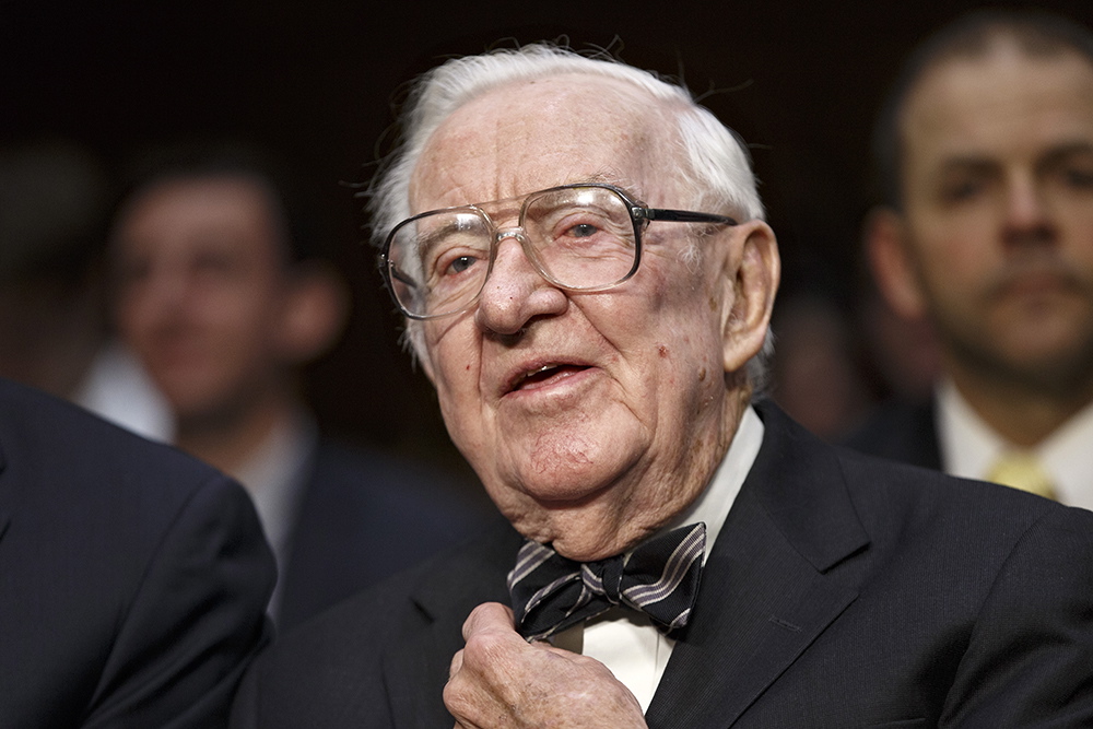 Retired Supreme Court Justice John Paul Stevens prepares to testify on the ever-increasing amount of money spent on elections as he appears before the Senate Rules Committee on Capitol Hill in Washington, Wednesday, April 30, 2014. The panel is examining campaign finance rules which have been eased since 2010 court decisions opened the door for wealthy political action committees that can accept unlimited donations as expressions of political speech. (AP Photo)