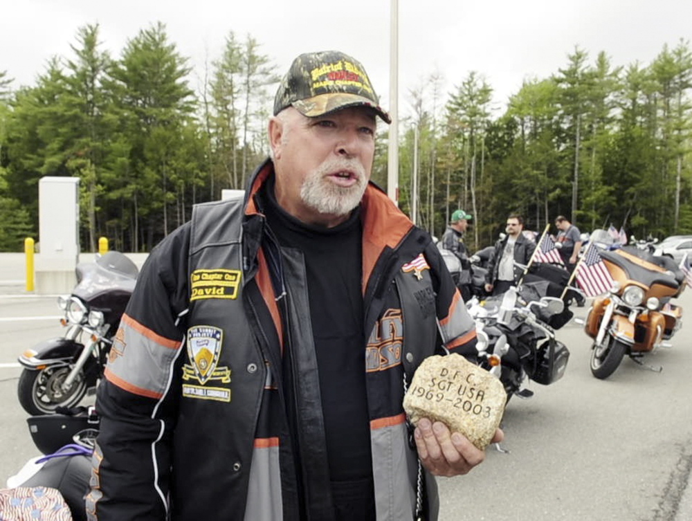 RECALLING A SOLDER: David Boyd talks about Army Sgt. Daniel Cunningham’s stone during a stopover by The Summit Project convoy on Friday at the West Gardiner rest area off the Maine Turnpike.