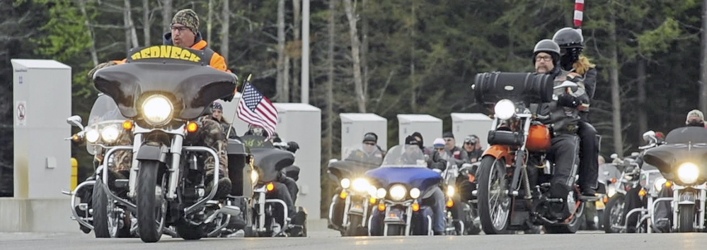 BOUND FOR BAXTER: The Summit Project convoy heads north on Friday as they leave the West Gardiner rest area off the Maine Turnpike.