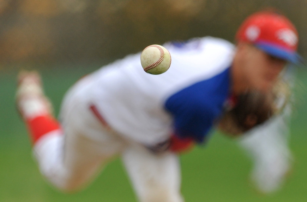 Pitcher: Messalonskee High School’s Jake Dexter delivers a pitch against Bangor in Oakland on Wednesday. Messalonskee defeated Bangor 4-3 in the bottom of the 7th inning.