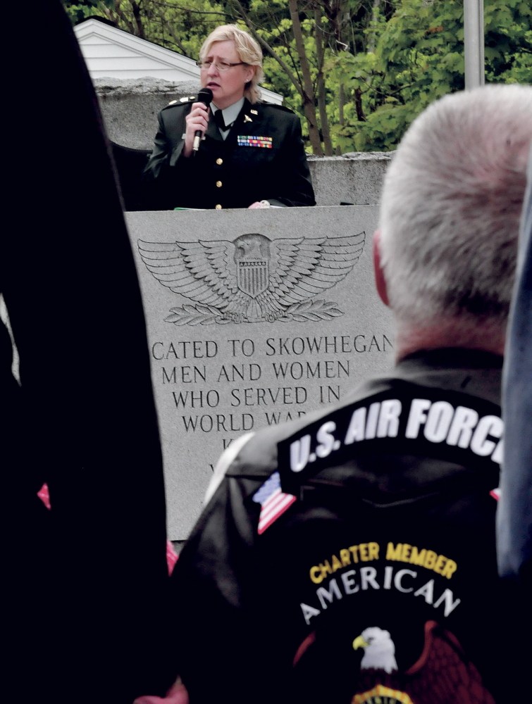 Staff photo by David Leaming HONOR: Susan Horsman, a 26-year veteran of the U.S. Airforce, was one of several speakers during a Memorial Day ceremony in Skowhegan on Monday, May 26, 2014.