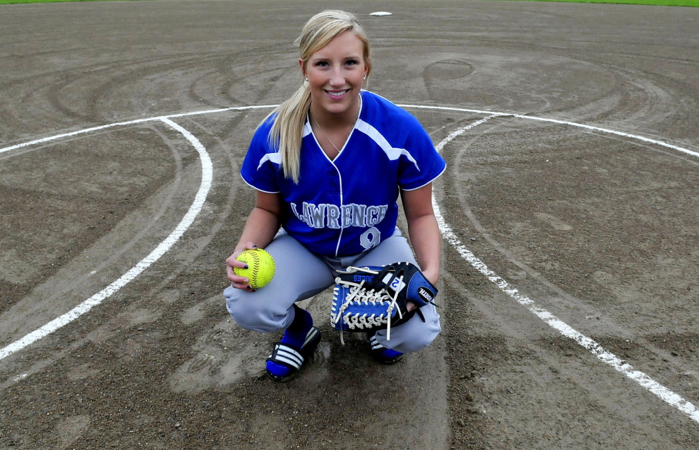 Staff photo by David Leaming Lawrence High School softball pitcher Julia Lawrence on the mound at the Fairfield school.