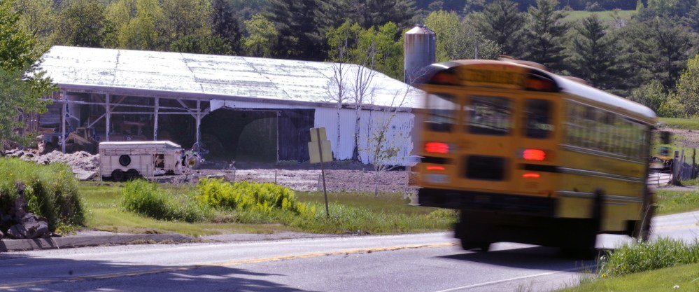 GONE: All the cows were gone Thursday from the Readfield farm belonging to Edward Munson. The cows were taken away by trucks following a collision with a bovine in front of the farm on Saturday.