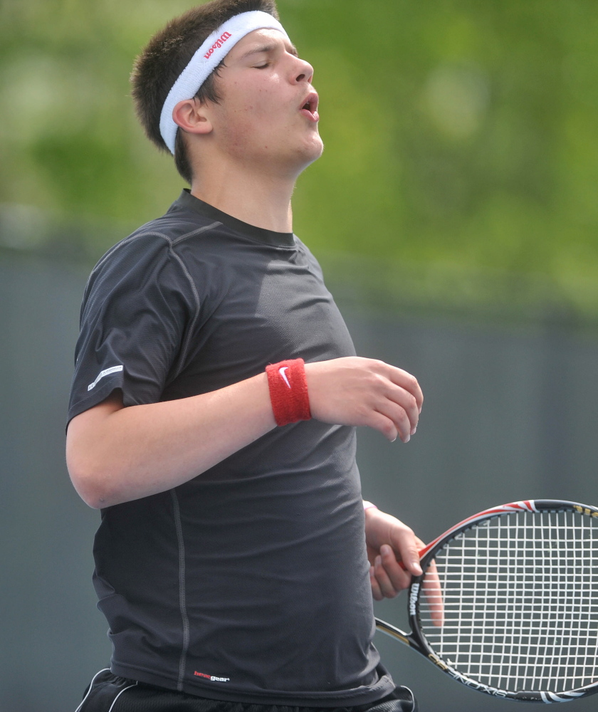 Loss: Monmouth Academy’s Kasey Smith reacts after losing a point to a Waterville Senior High School’s Zack Disch at the Round of 48 singles tournament hosted by Colby College in Waterville on Saturday. Disch defeated Smith, 3-6, 6-3, 6-3.