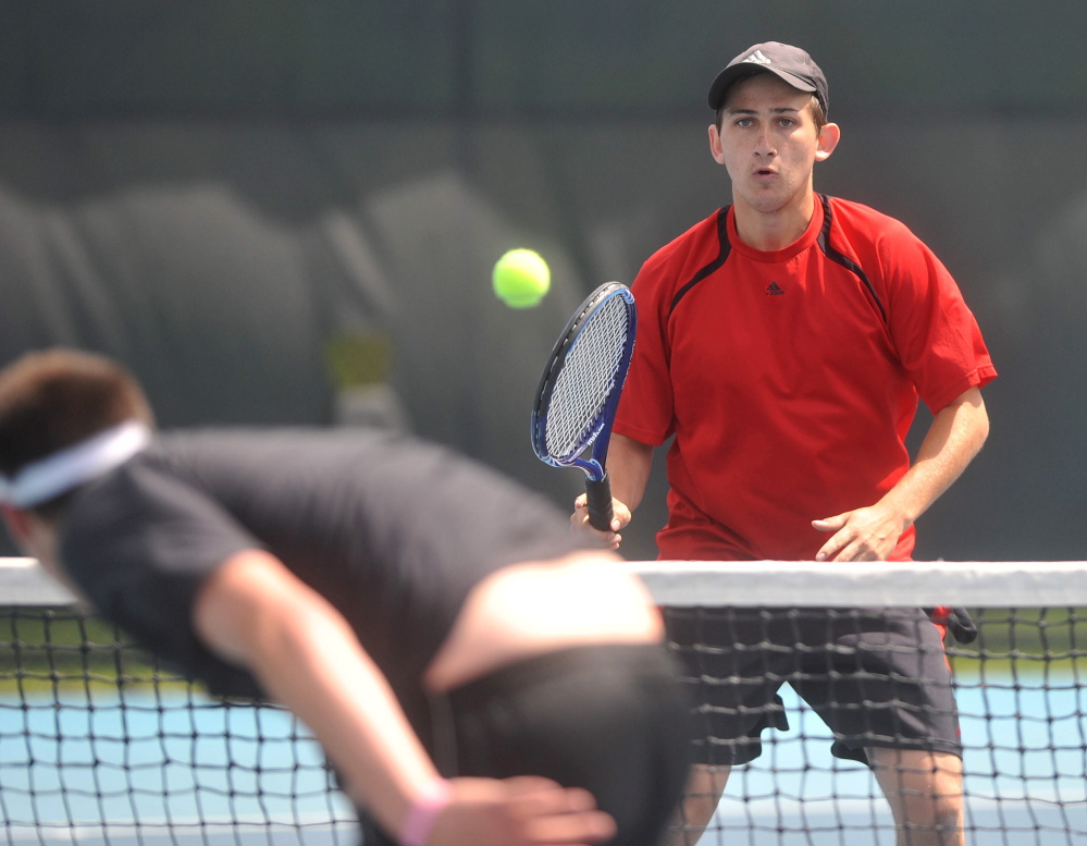Hitter: Waterville Senior High School’s Zack Disch returns a shot from Monmouth Academy’s Kasey Smith at the Round of 48 singles tournament hosted by Colby College in Waterville on Saturday. Disch defeated Smith, 3-6, 6-3, 6-3.