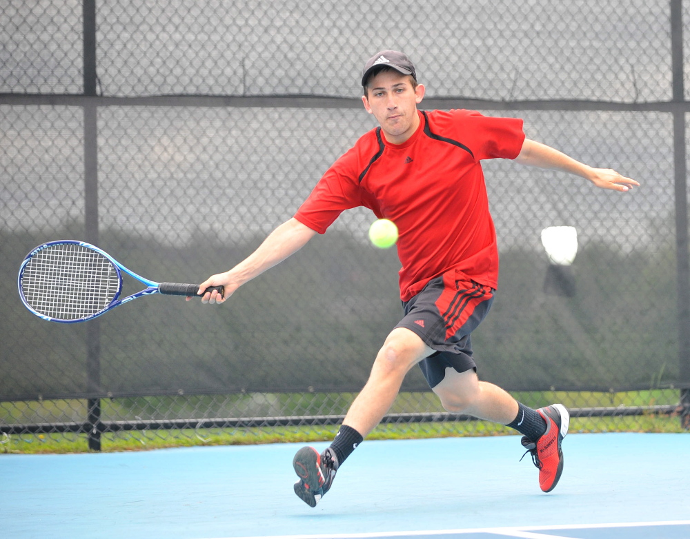 Return: Waterville Senior High School’s Zack Disch returns a shot from Monmouth Academy’s Kasey Smith at the Round of 48 singles tournament hosted by Colby College in Waterville on Saturday. Disch defeated Smith, 3-6, 6-3, 6-3.