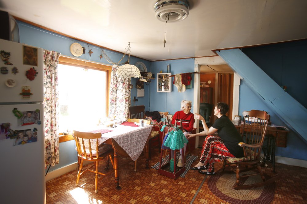 Nurse practitioner Jennifer Desmond talks with Ruth Ames, 97, at Amesâ home on Vinalhaven, an island 75 minutes from Rockland by ferry. âEvery time I see her number on caller ID, I think, âOh no, whatâs wrong with Ruth?â â Desmond said. âShe usually is just calling to tell me that she picked crab that morning.â