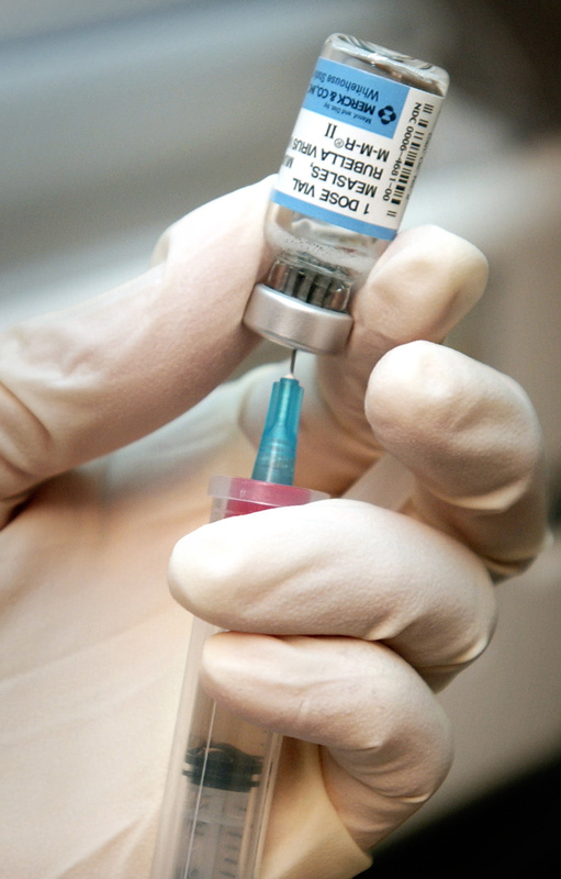 A nurse draws a dose of mumps, measles, and rubella vaccine. Measles cases in the last five months have caused more U.S. illnesses than in any entire year since 1996, according to the Centers for Disease Control and Prevention.