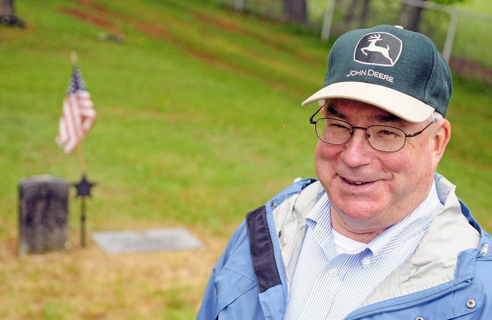 Staff photo by Joe Phelan HONOR: Town cemetery sexton Tom Reed recently installed a new marker for Thomas O’Connell, who won the Medal of Honor in the Civil War and is buried in Rest Haven Cemetery in Windsor.