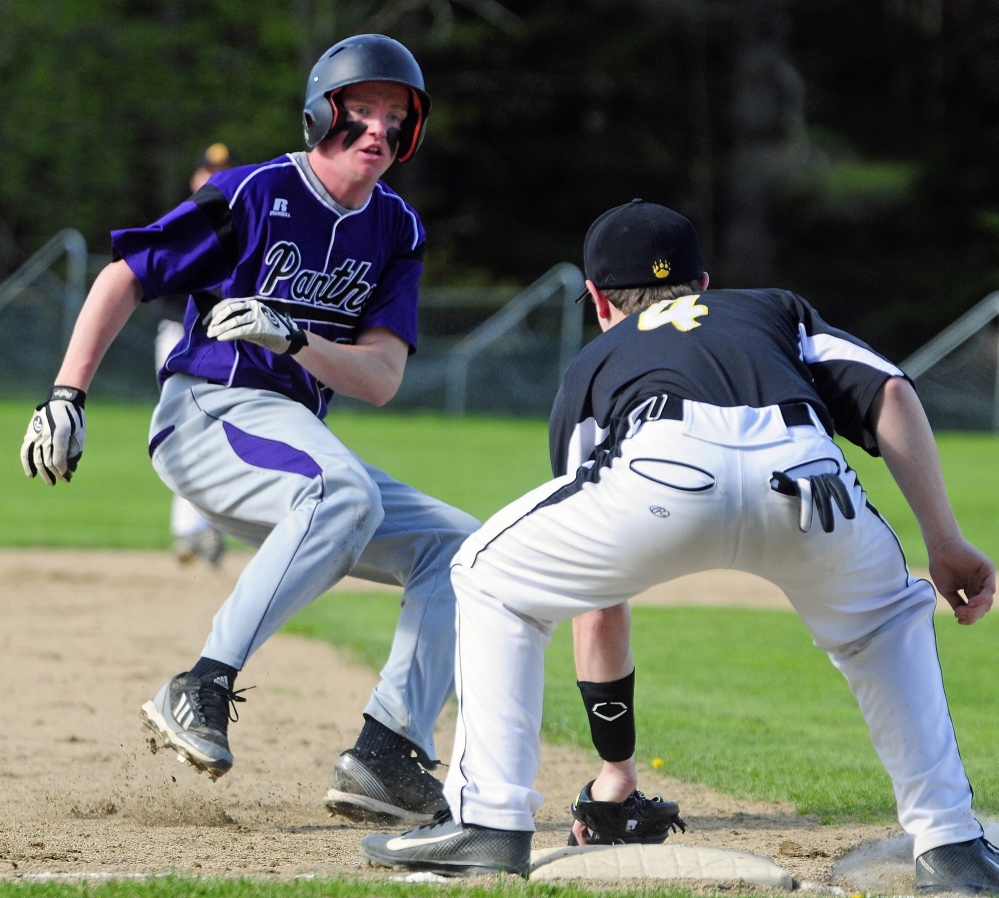 Staff photo by Joe Phelan READY TO ROLL: Kaleb Kane, left, and the Waterville baseball team get a bye into the quarerfinal round of the Eastern Class B playoffs.