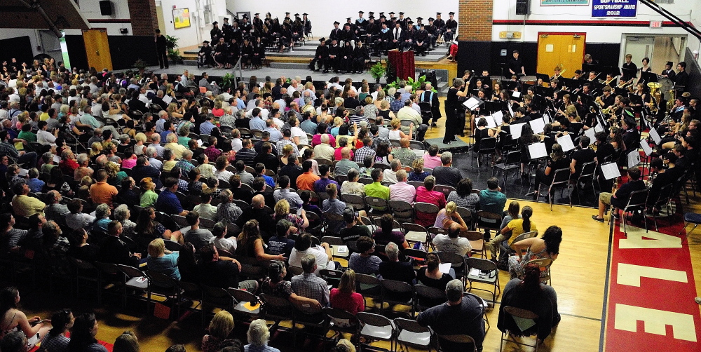 Staff photo by Joe Phelan On a high note: The Hall-Dale High School Concert Band performs “Journey to Albebaran” at graduation Saturday in the school’s Penny Memorial Gymnasium in Farmingdale.
