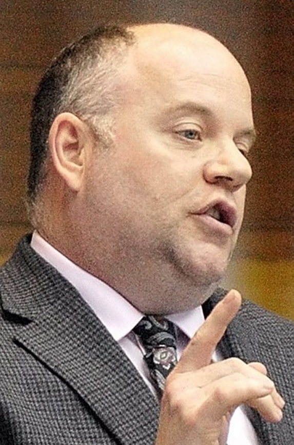 Staff photo by Joe Phelan Withdrawing: Rep. Lance Evans Harvell makes a speech during a brief debate on L.D. 1333, an ambitious GOP health insurance reform measure. Harvell has announced that he is ending his re-election bid for House District 89, which includes Farmington and Industry.
