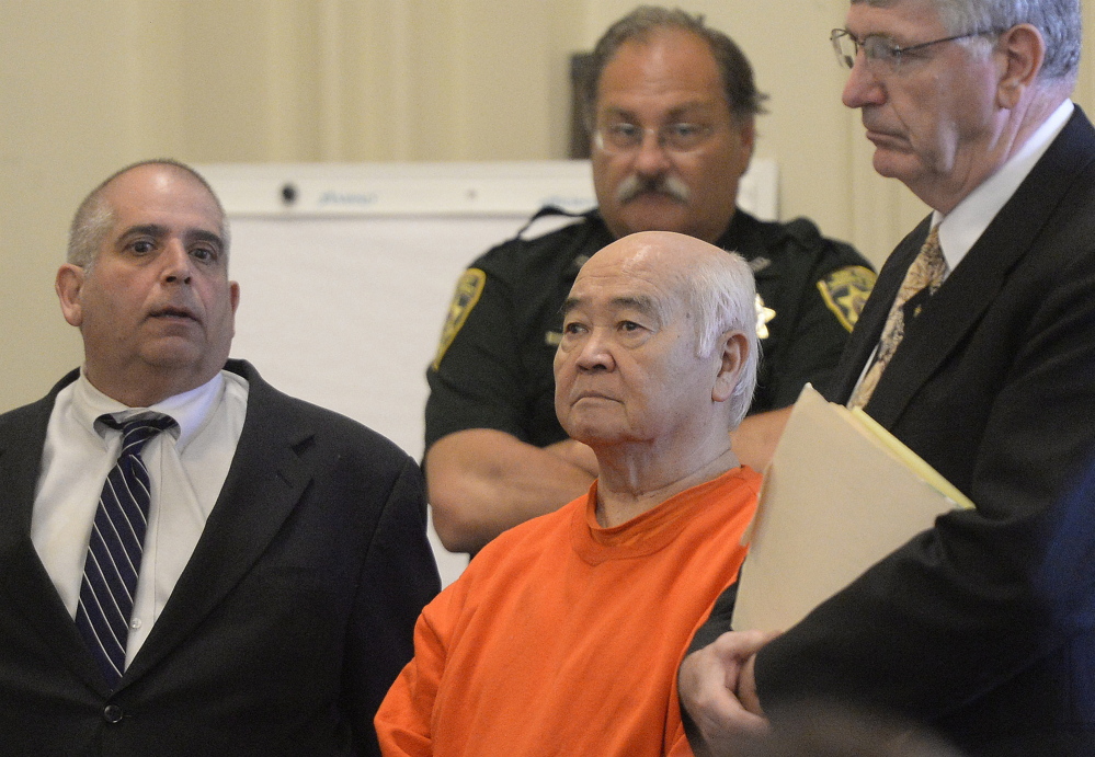 Shawn Patrick Ouellette / Staff Photographer James Pak of Biddeford appears in court Tuesday along with his attorneys, Lawrence Goodglass, left, and Joel Vincent.  Pak pled not guilty by reason of insanity to two counts of murder in the deaths of Derrick Thompson, 19, and Alivia Welch, 18.
