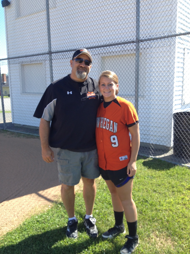Born to play: Skowhegan first baseman Taylor Johnson, right, grew up around softball fields. Her dad Lee, has worked as an assistant coach at Skowhegan since before Taylor was born