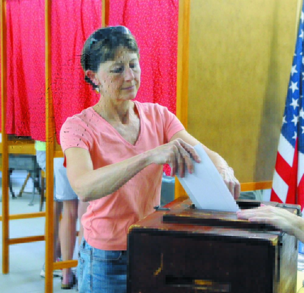 Staff file photo by Joe Phelan Town Meeting: Fayette residents will decide June 14 whether to continue to maintain Starling Hall, which has been used as a polling place.