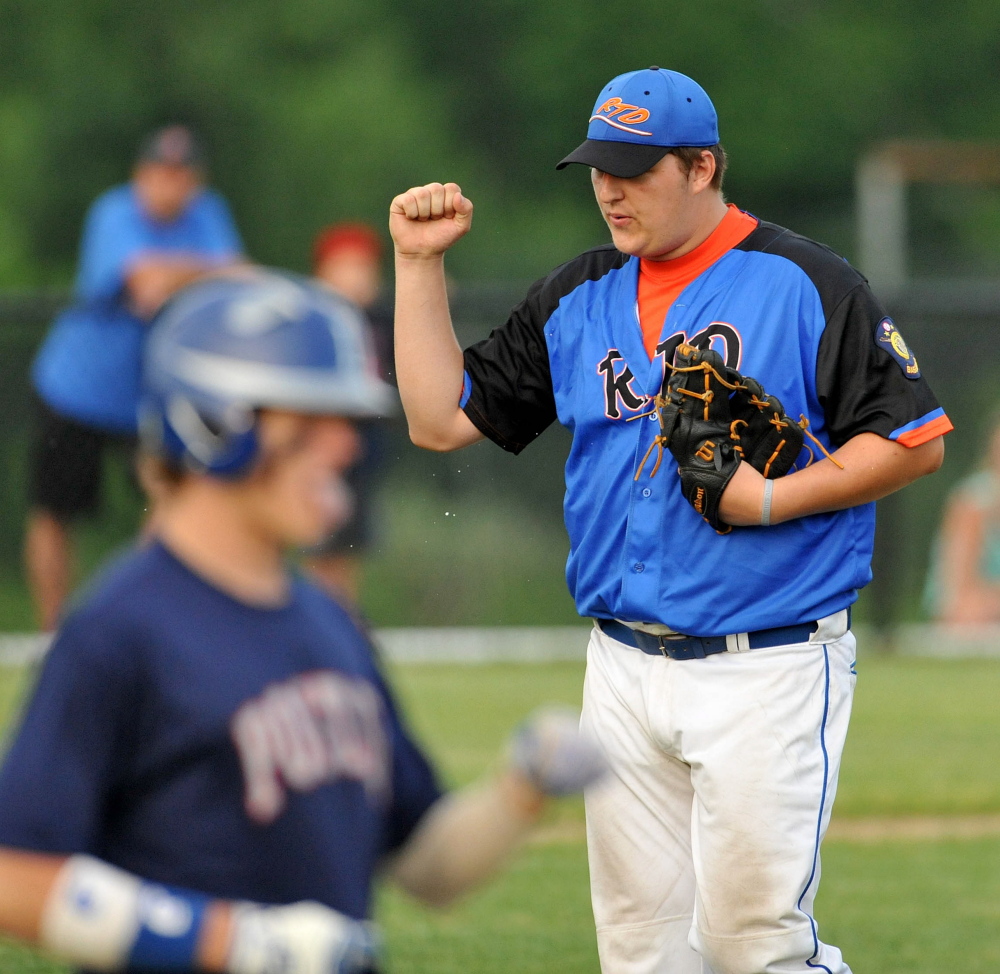 RTD of Madison pitcher Taylor Bacon, 40, celebrates after defeating Post 51 at Colby College Tuesday. RTD defeated Post 51 5-2.