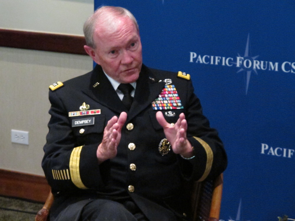 Gen. Martin Dempsey, chairman of the Joint Chiefs of Staff, speaks to reporters after a forum on military issues in Honolulu on Tuesday.