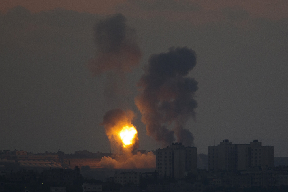 Smoke and fire rise following an Israeli strike on Gaza, seen from Israel-Gaza border on Tuesday.