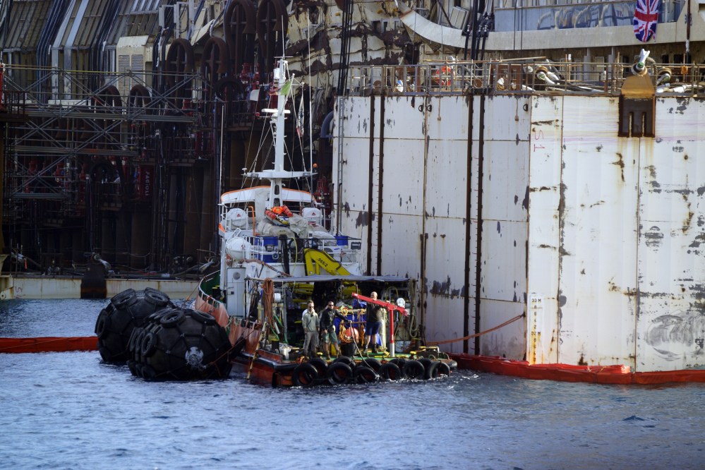 Authorities expressed satisfaction that the operation to float the Concordia from an underwater platform had proceeded without a hitch early Monday. The cruise liner struck a reef in January 2012 and capsized, killing 32 people.