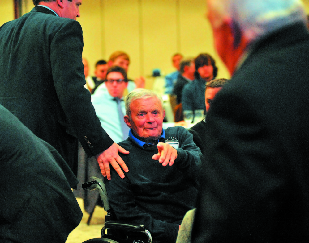 Dr. John Winken points during a ceremony at Colby College in March 2011, when the school retired Winkin’s No. 5 jersey. Winkin coached the Colby baseball team for 20 years, winning 229 games. He finished his career with more than 1,000 coaching victories. Winkin died Saturday. He was 94.