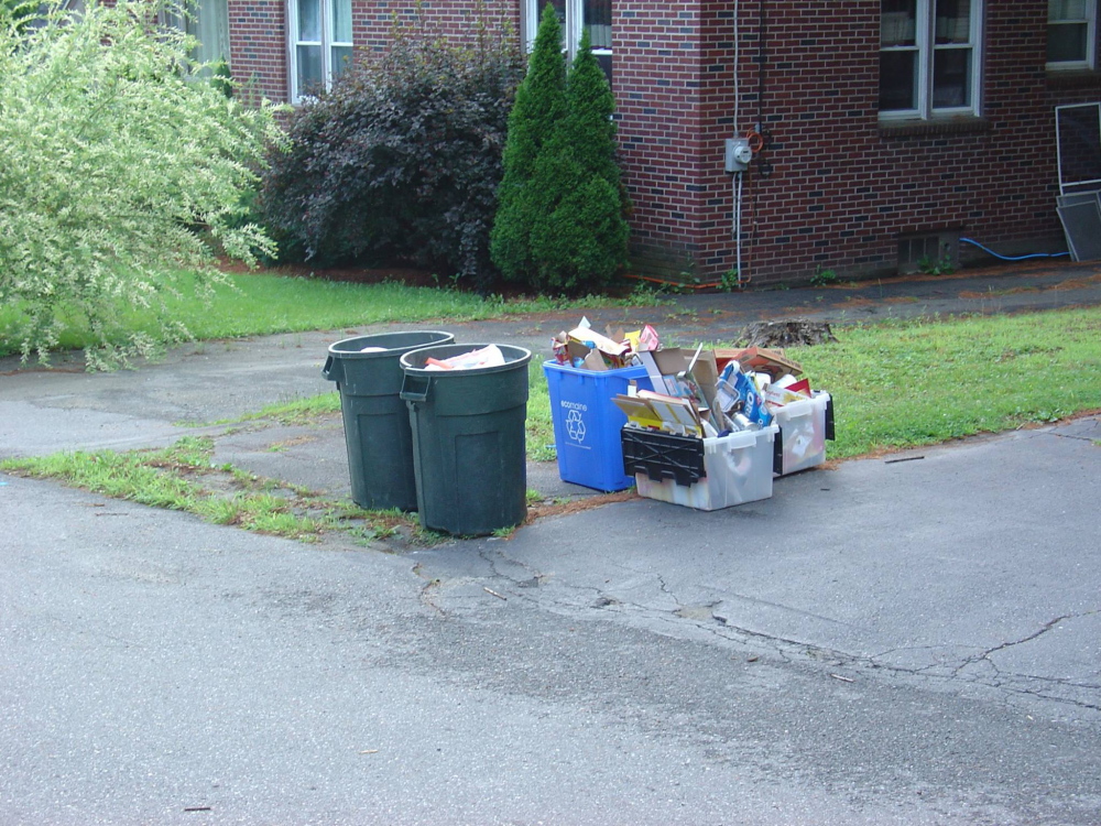 The first week of curbside recycling in Waterville produced a 10 percent decrease in rubbish collections, as residents began to separate recyclable materials from rubbish for collection outside their homes.