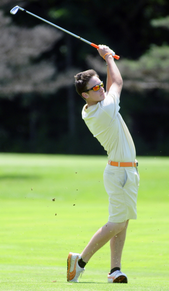 Luke Ruffing hits on the ninth fairway during his first Maine Open on Tuesday at the Augusta Country Club in Manchester.
