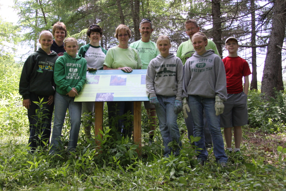 Kennebec Savings Bank staff members and their family recently volunteered at Viles Arboretum in Augusta. Mindy Jorgensen, head of maintenance at the bank, coordinated coffee and doughnuts for volunteers before work began. Volunteers assisted arboretum staff in restoring the white ash collection. The work completed during that day essentially cleared a quarter of this collection, removing buckthorn, honeysuckle and the occasional bittersweet vine, according to a news release from Mark DesMeules, the arboretum’s executive director.  Front, from left, are Talia Jorgensen, Amanda Jorgensen; and back, from left, are Mindy Jorgensen, Mary Hammond, Judy Johnston, Mark Johnston, Todd Jorgensen and Ethan Hammond.