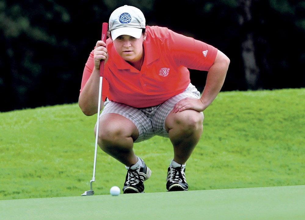 Staff photo by David Leaming 
 Maine Women’s Amateur defending champion Emily Bouchard of Biddeford-Saco eyes her next shot on the 8th hole at the Waterville Country Club.
