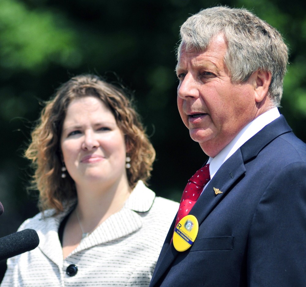 Democratic candidate Emily Cain, left, and independent candidate Blaine Richardson make a joint appearance to discuss 2nd Congressional District debate plans on Thursday outside the State House.