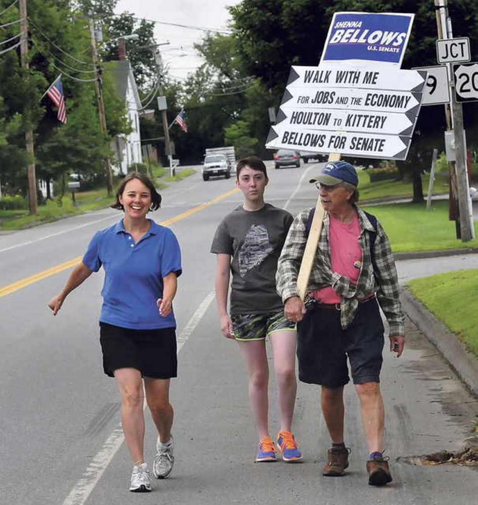 Democratic U.S. Senate candidate Shenna Bellows walks down U.S. Route 202 in Unity on Friday.